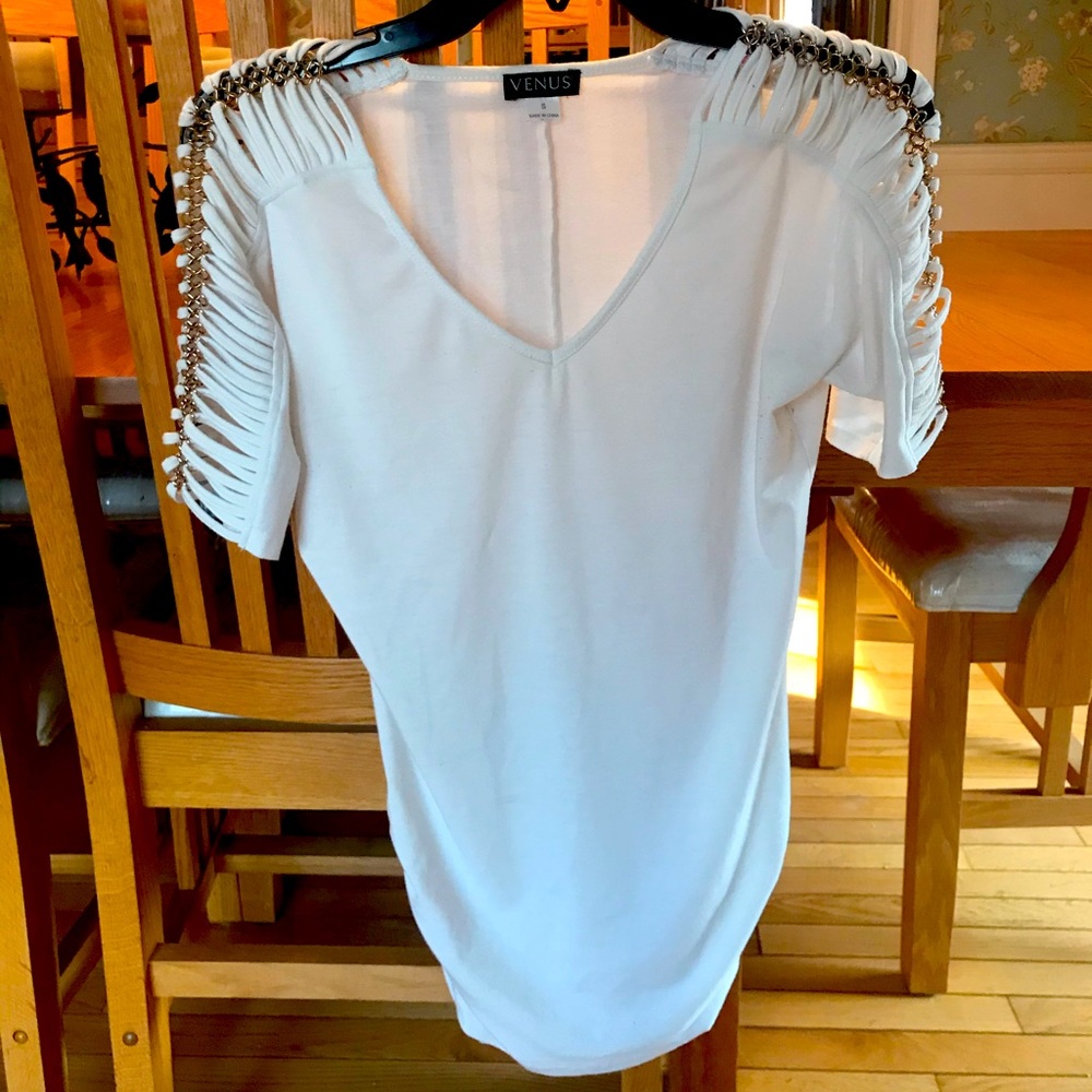 Off-white top with peek-a-boo chain link sleeves